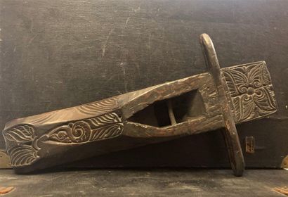 null Indonesian plane with carved floral decoration, missing the corner and the iron....