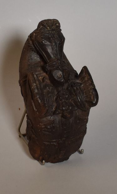 null MARINE HORSE in carved wood, Indonesian work. Height 25 cm