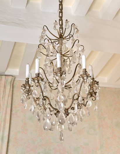 null Bronze chandelier with ten arms of light decorated with pendants, pearls and...