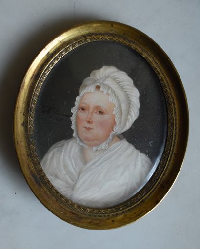 null MINIATURE ovale : Portrait de femme à la coiffe. Signée Rousseau et datée 1822....