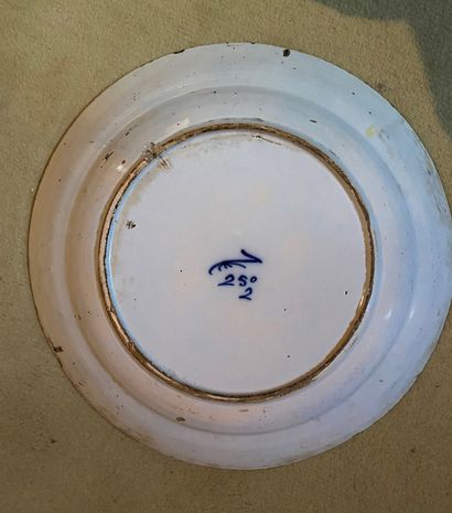 null DELFT earthenware PLATE in blue monochrome with fan-shaped feather decoration....