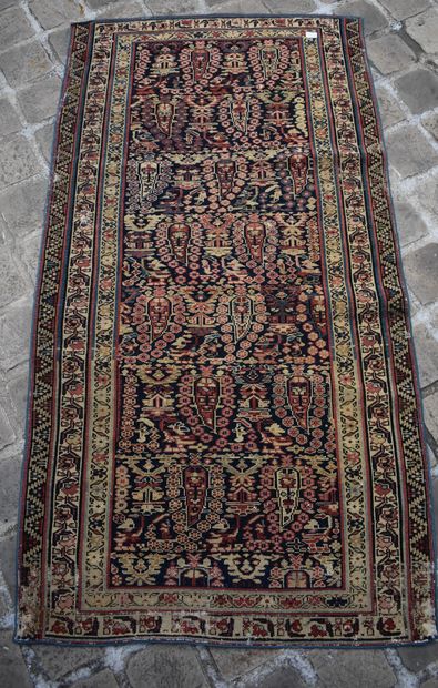 TWO oriental carpets (wear and tear).
