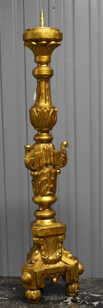 null CANDLE STICK in gilded wood.