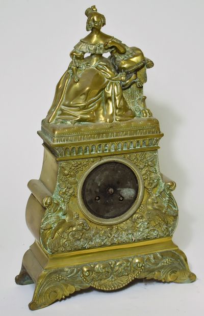 null HANGING bollard in gilt bronze decorated with a woman leaning against a cushion....