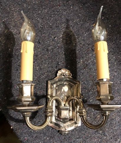 null 
Pair of two-light sconces in silver plated metal. Height 19 cm
