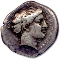 null BRUTTIUM - TERINA 420-400. Head of the nymph Terina adorned with jewels, her...