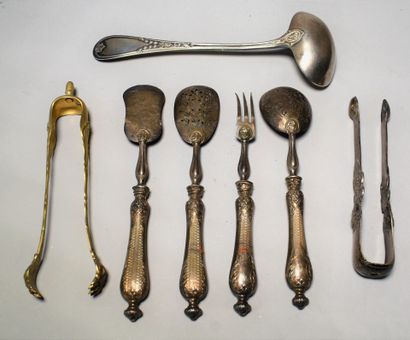 null SILVER LOT: Sauce spoon, two sugar tongs, four pieces of candy with filled handle....
