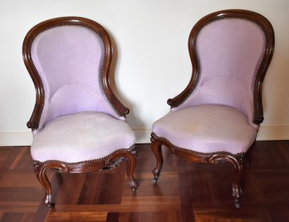 null Pair of mahogany gondola chairs. Louis-Philippe period. Purple velvet upholstery....