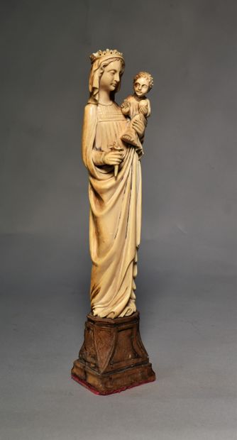 null 
STATUTE of Virgin and Child in gothic style. Wooden base (small chips). End...