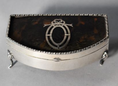 null A silver half-moon jewellery box standing on four small arched legs, with a...