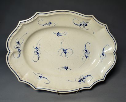 null Oval dish in fine earthenware, decorated with a twig (restoration). Length:...