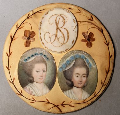 null TWO MINIATURES Portraits of women and a monogram mounted in the same frame of...