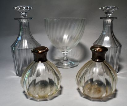 null LOT OF CRYSTALRY: A PAIR OF CARAFONS, A TWISTED CUP on foot and A PAIR OF FLACONS...