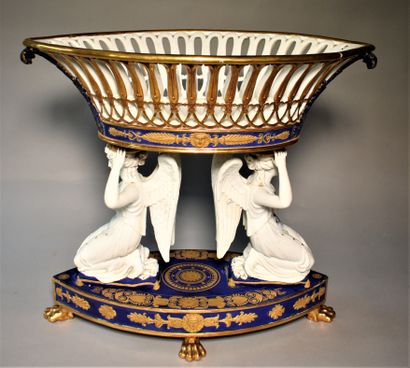 null PARIS: A biscuit table top partly enamelled with gilded decoration representing...