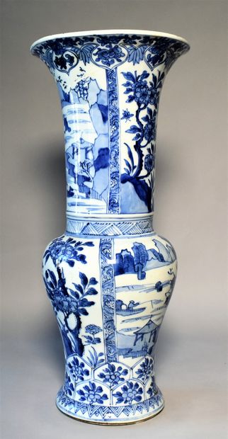 null CHINA: A blue and white porcelain baluster vase, decorated in reserves with...
