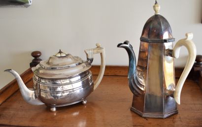 null An English silver teapot, London 1811 (incomplete - gross weight 506 g) and...
