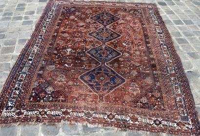 null 
LOT OF FOUR RUGS Orient : One with blue background, red center and spandrels,...