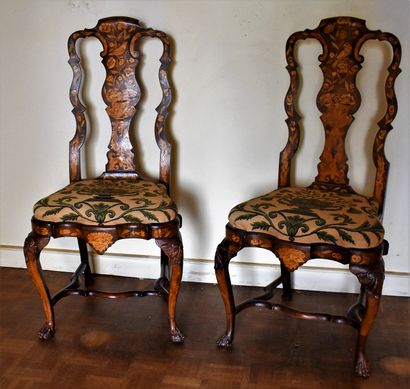 null A PAIR OF CHAIRS with an inlaid floral and bird design. Holland, around 1800....