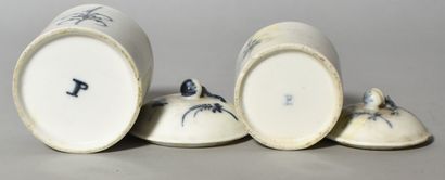 null TWO POTS of pomade in soft paste, decorated with blue twigs. Marked P. Height...