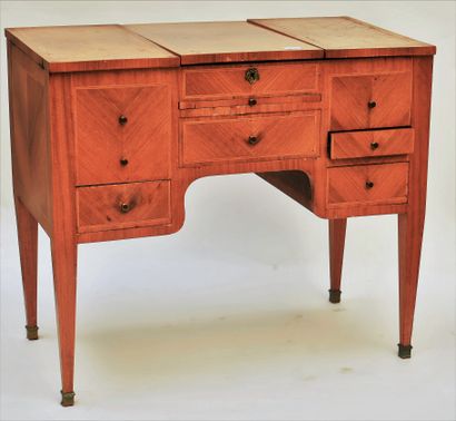 null Rectangular rosewood veneer COIFFEUSE with four drawers and a pull-out front....