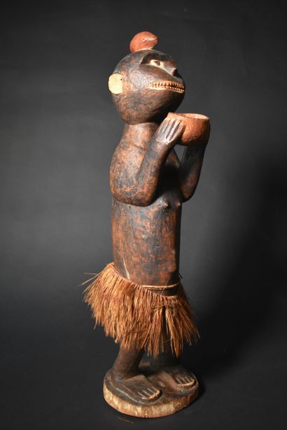 null Baule mendicant monkey decorated with a loincloth. Height 59 cm

Lot delivered...