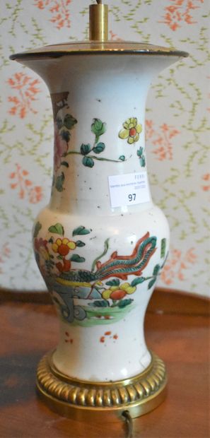 null A Chinese porcelain baluster vase decorated with Famille rose chrysanthemums...