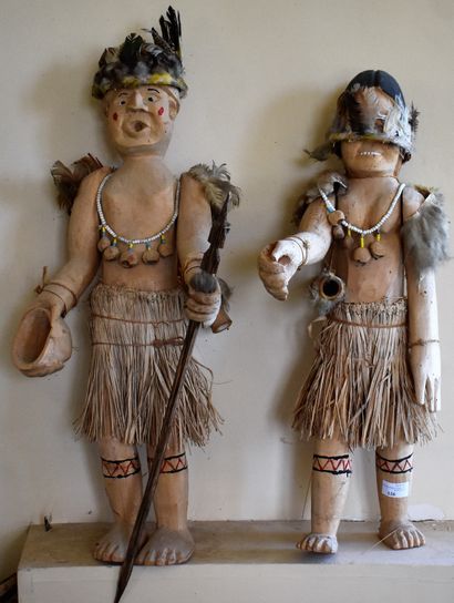 null 
TWO STATUETTES of polynesian warriors in carved wood and raffia. 

(accidents...