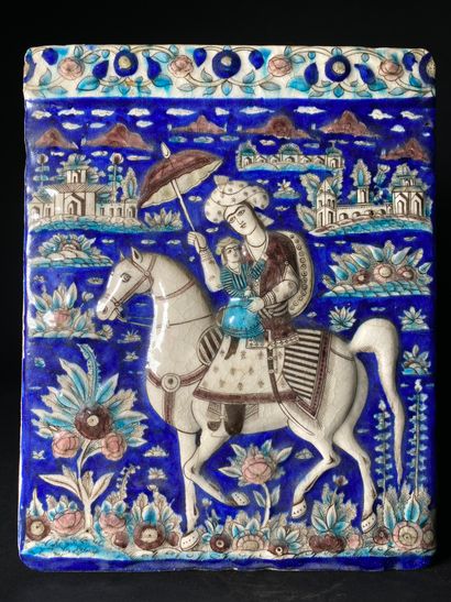 null Iranian glazed earthenware lining tile decorated with a rider and a child on...