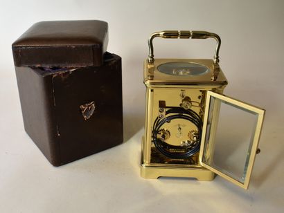 null Gilt bronze cage clock, dial signed L'Epée à Sainte-Susanne. Height 13 cm

With...