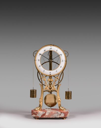 Skeleton clock in gilt bronze, the movement...