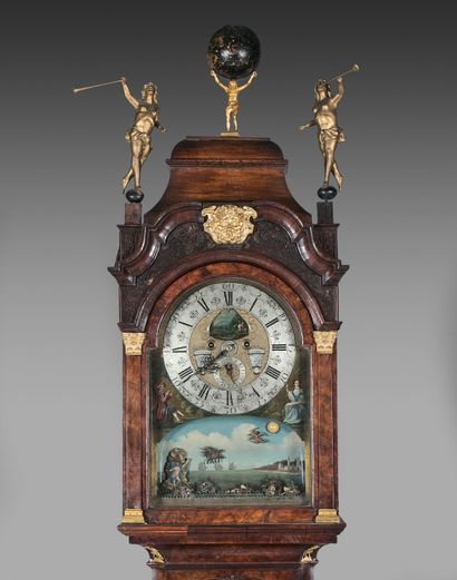 null Walnut and burr walnut floor clock topped by two statuettes of Renown and an...