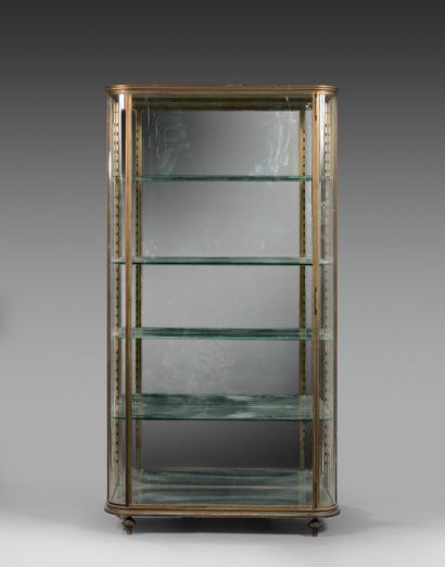 Gilded bronze display case with a door. Rounded...