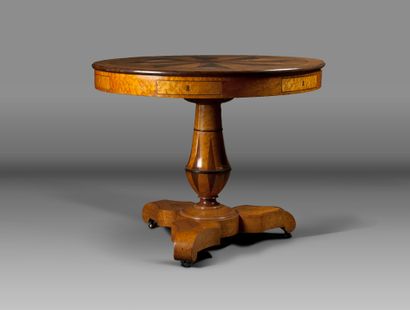 A tripod pedestal table in light wood veneer,...