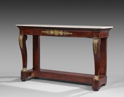 A flamed mahogany veneer console table opening...
