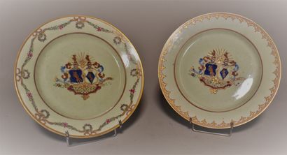null TWO porcelain plates decorated with a polychrome coat of arms.

Diam. 23 cm

Lot...