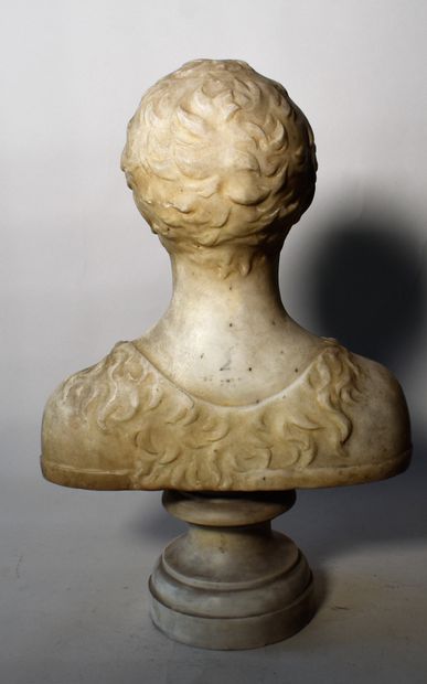 null A marble child's bust on a pedestal. Height 42 cm

Lot delivered to the fir...