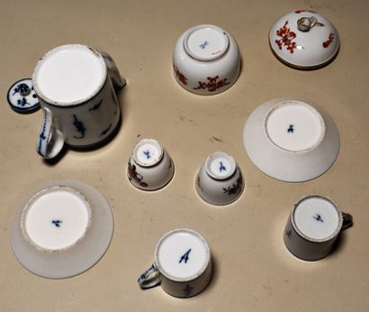 null SAXE: lot including a coffee pot, two cups and saucers, candy box and two sorbets...