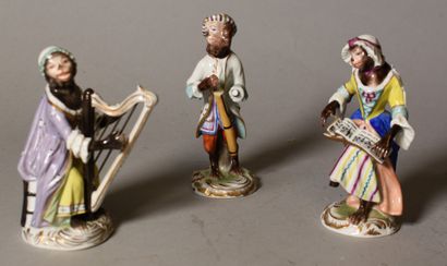 null SAXONY: THREE porcelain STATUETTES of the monkey orchestra, marked (small accidents...