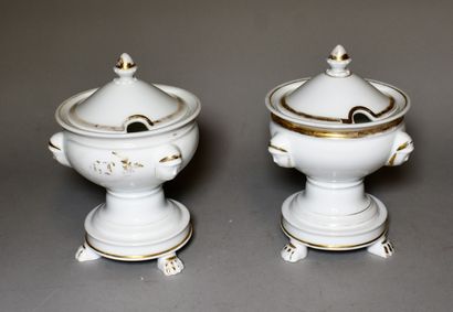 null PARIS : PAIR OF JAMMERS covered in white and gold porcelain (worn). 19th century....