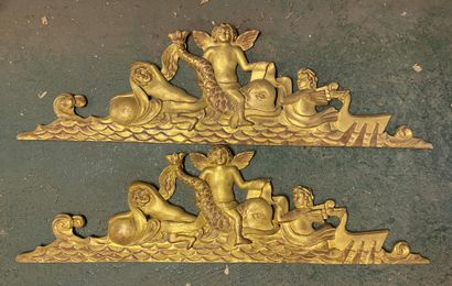 TWO PANELS in carved and gilded wood decorated...