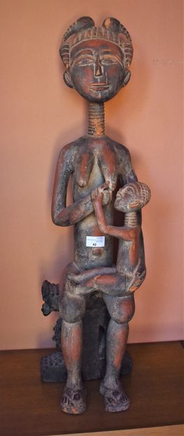null STATUTE of a couple in patinated wood (accidents of use). African work. Height....