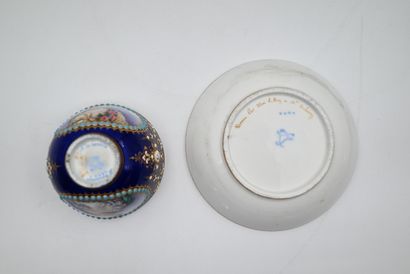 null Mug and saucer in porcelain with blue bottom. The cup decorated with two medallions...