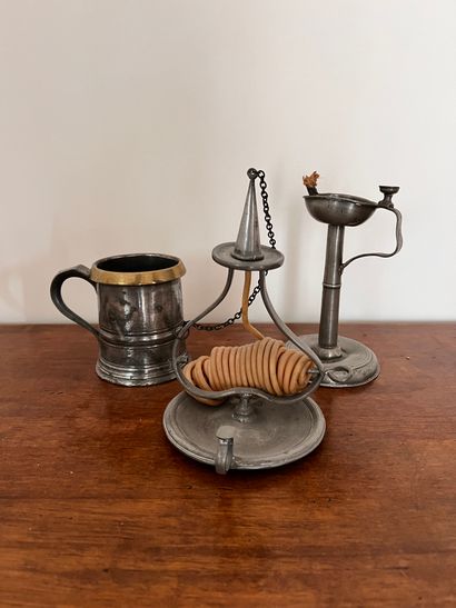 null THREE TIN PIECES: candle holder, mug and oil lamp.