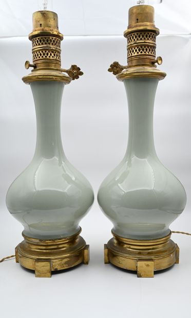Pair of oil lamps in earthenware celadon...