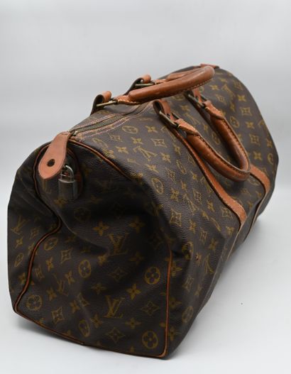 LOUIS VUITTON: Weekend bag in leather and...