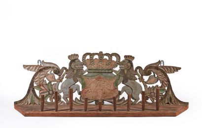 null Shelf with a polychrome scalloped backsplash decorated with two lions supporting...