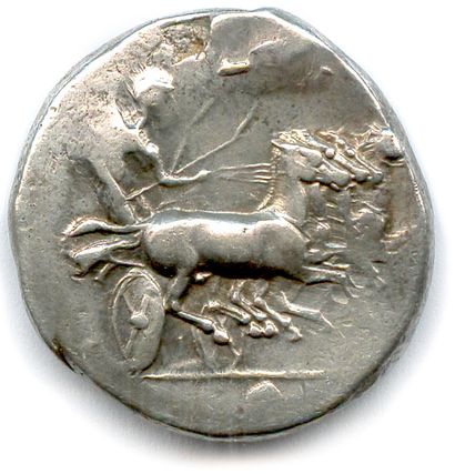 null SICILY - GELA 415-405

Quadriga led on the right by a charioteer. 

R/. Protome...