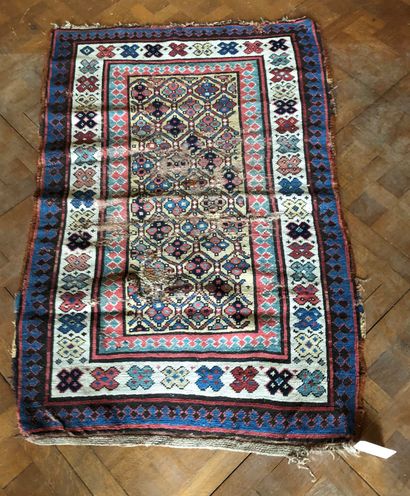 null ORIENT RUG with geometrical floral polychrome decoration (wear). Length. 134...