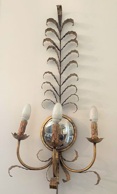 null Gilded three-light metal sconce with witch glass. Height: 80 cm