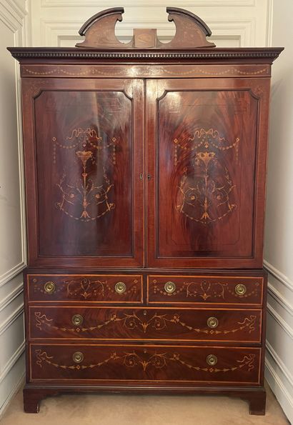 null Two-body marquetry BUFFET with foliate decoration opening to three rows of drawers...